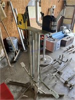 TWO METAL SHRINKER STRECTHER TOOLS ON STAND WITH