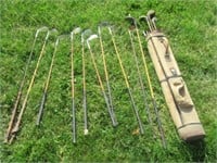 Vintage Golf Clubs with Wood Handles.