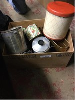 Tins, heater and pot
