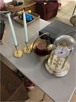 Brass clock, candle holders, basket and candle