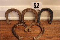 FIVE THROWING HORSESHOES