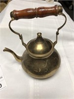 Vintage brass teapot with wooden handle