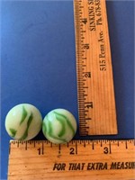 2 green and white swirl shooter marbles1 in. each