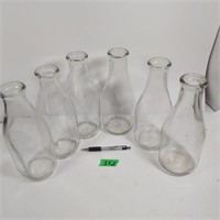 6 No name milk bottles