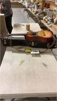 Korean made  Guitar w/ case- needs re-strung