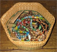 (R) Woven basket with bead and shell necklaces