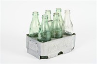 COCA-COLA ALUMINUM SIX PACK CARRIER WITH BOTTLES