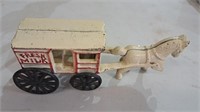 Antique cast iron milk wagon toy. Horse is