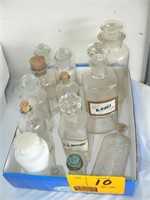 FLAT WITH VINTAGE PHARMACY BOTTLES