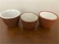3 brown small ceramic bowls