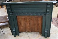 wood mantle in green paint
