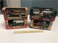 4 NIB Die Cast Model Cars with Store Logos