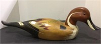 Carved and painted solid wood duck decoy