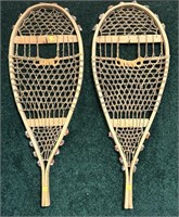 Vintage pair of wooden snowshoes,