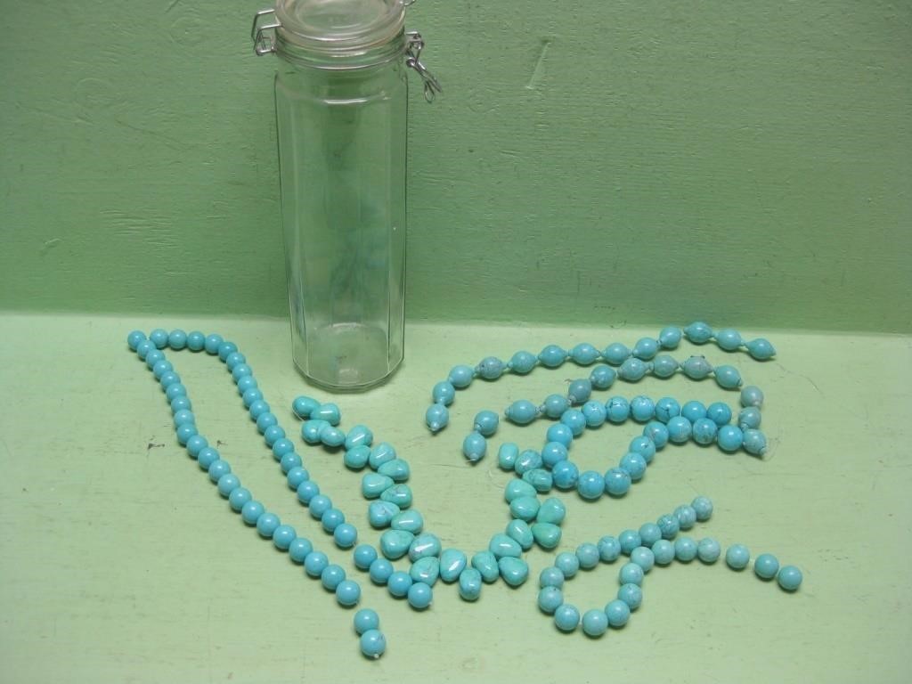 Turquoise Colored Strung Beads In13" Container