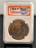 1885O Morgan Dollar - Rainbow Toned