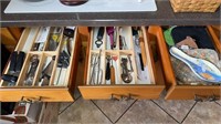 Three kitchen drawers of kitchen, gadgets, can