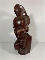 Heavy carved African wooden statue