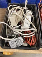 Extension cords and plug-in strips in a stacking