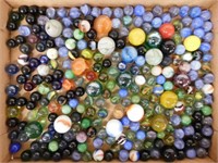 Flat of glass marbles including 21 shooters