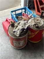 MISC GAS CANS, PLASTIC AND METAL, IN GARAGE