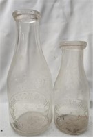 Pair of vintage Pinkston dairy glass bottles