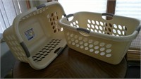 two clothes baskets, one new