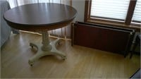40" dining table, comes with 2 leaves
