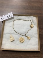 Carved Ivory? Neckless Charms