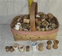 Basket Full of Wooden Thread Spools