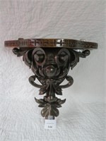 A Figural Carved Wall Sconce