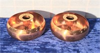 two copper candle holders