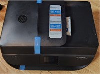 HP printer never used still has factory paper .