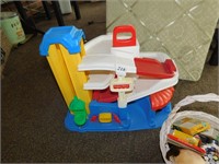 VISION BOARD; FISHER PRICE PLAY SET; BASKET OF