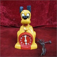 Vintage pluto clock figural.