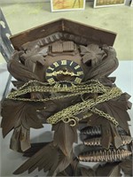 Cuckoo clock with weights