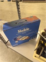 Modelo, summer lounger, flower pots, bird f