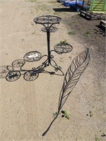 Metal multi tier plant stand and a leaf yard ornam