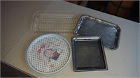 4 plastic and metal serving trays