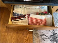 Contents of four drawers, towels, utensils