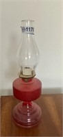 Red Victorian oil lamp