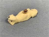 Ivory carving of an otter by Utuqsiq with shell 2.