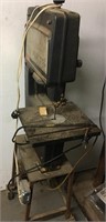 Craftsman 12 inch bandsaw on portable table