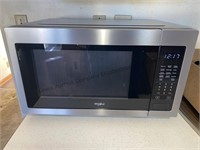 Whirlpool microwave plugged in and working