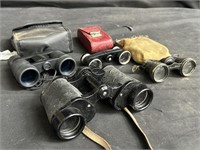 Four pairs of vintage binoculars