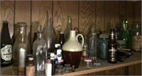 Contents of shelf with bottles and jars