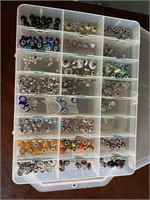 Double decker box of beads and fundings.