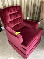 Red fabric swivel rocker, does not recline