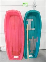 2 Plastic sleds; 1 has been repaired