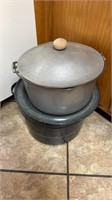 Large aluminum cookpot with the lid and swinging